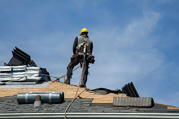 Professional Roofing technician working in Adelphia, NJ